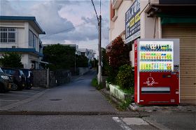 Vending machine at the entrance to a side street in Okinawa, Japan. Fuji X100v.