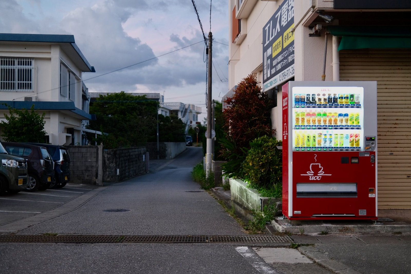 Vending machine at the entrance to a side street in Okinawa, Japan. Fuji X100v.