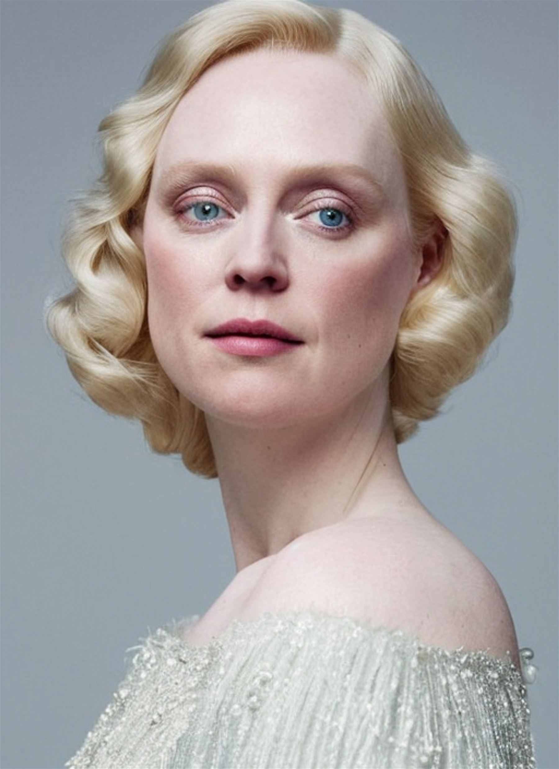 A dreamy and ethereal portrait of Gwendoline Christie, with a soft and angelic appearance, inspired by the works of Dave Rapoza and J.A.W. Cooper, featuring a pastel color palette and delicate details