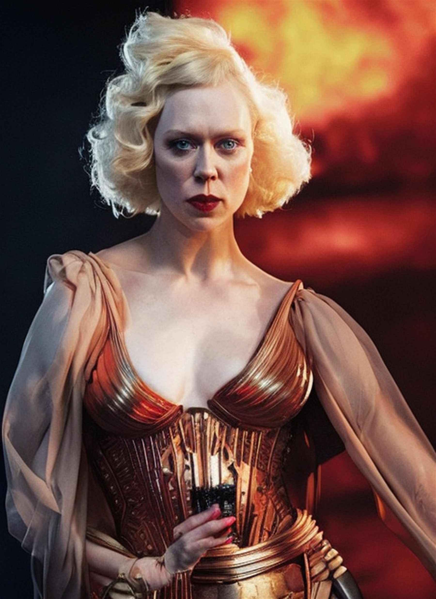 A bold and striking portrait of Gwendoline Christie, with a fierce and powerful expression, inspired by the works of Frank Frazetta and Simon Bisley, featuring strong contrasts and dramatic lighting.