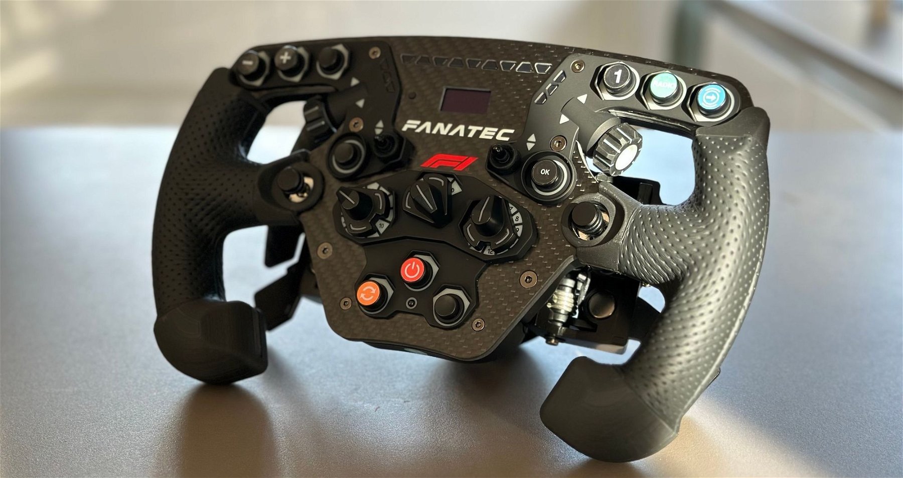 Fanatec F1 2021 Limited Edition wheel with custom perforated leather grips, owned by one of our F1Laps team members